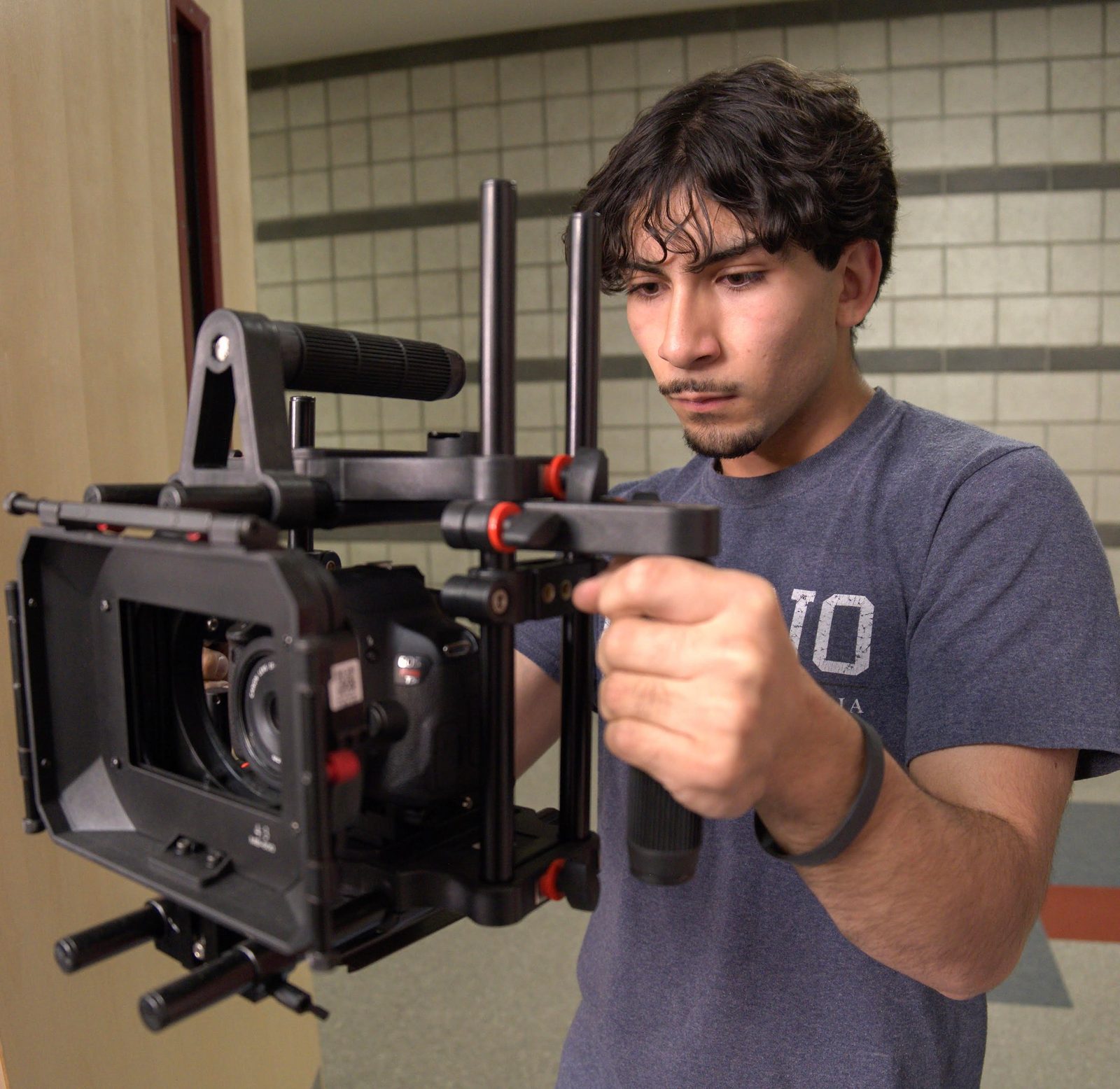 Antonio Carrillo framing a shot with a camera on a shoulder rig